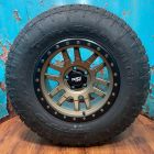 17x9 CANYON PRO 6x5.5 Wheels 33" Nitto Terra Grappler G2 Tires