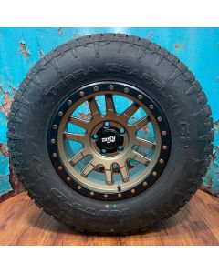 17x9 CANYON PRO 6x5.5 Wheels 33" Nitto Terra Grappler G2 Tires